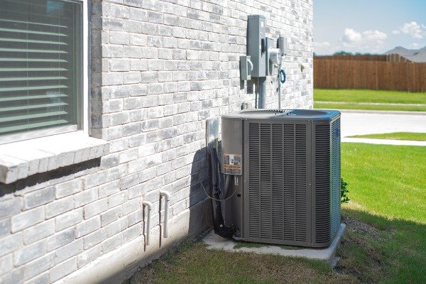 Residential central air conditioner installed at an Aurora home
