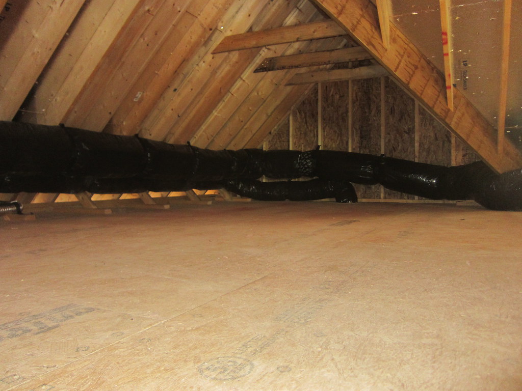 Flexible ductwork running through an Aurora attic